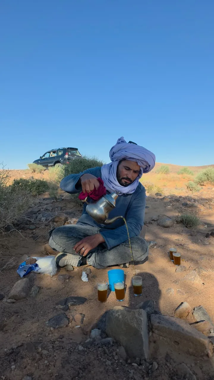 Traditional tea served outdoors during a desert excursion