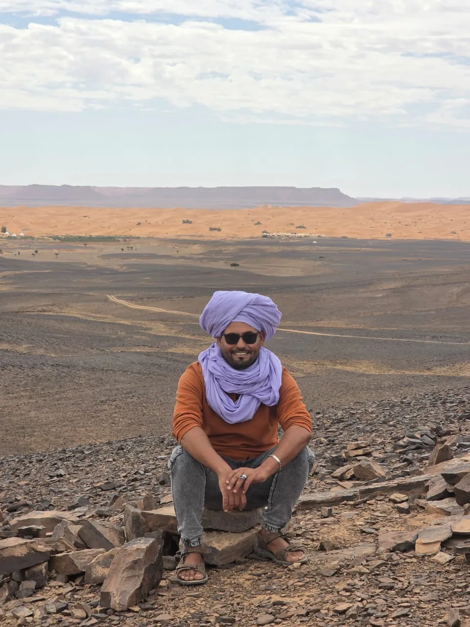 Local desert guide at a viewpoint near Merzouga
